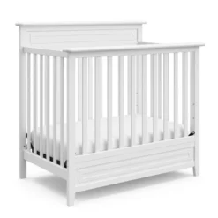 Storkcraft Petal Convertible Mini Crib With Mattress -Nursery Furniture Store GUEST d1a81ce6 1f75 4737 9745 09af12b61b2f